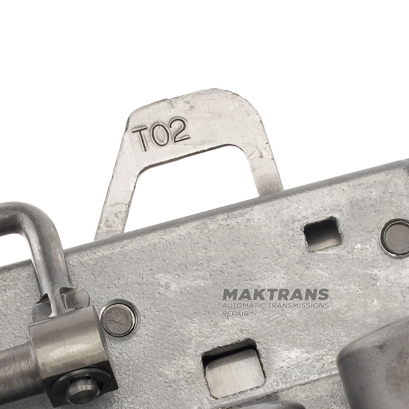 Teleso ventilu (použité, netestované) kompletné so solenoidmi TOYOTA / LEXUS A750 (oddeľovacia doska T02) - demontované z prevodovky označené 3501060A50, 35010-60A50 (Lexus GХ470 2003, UZJ120, 2UZFE)